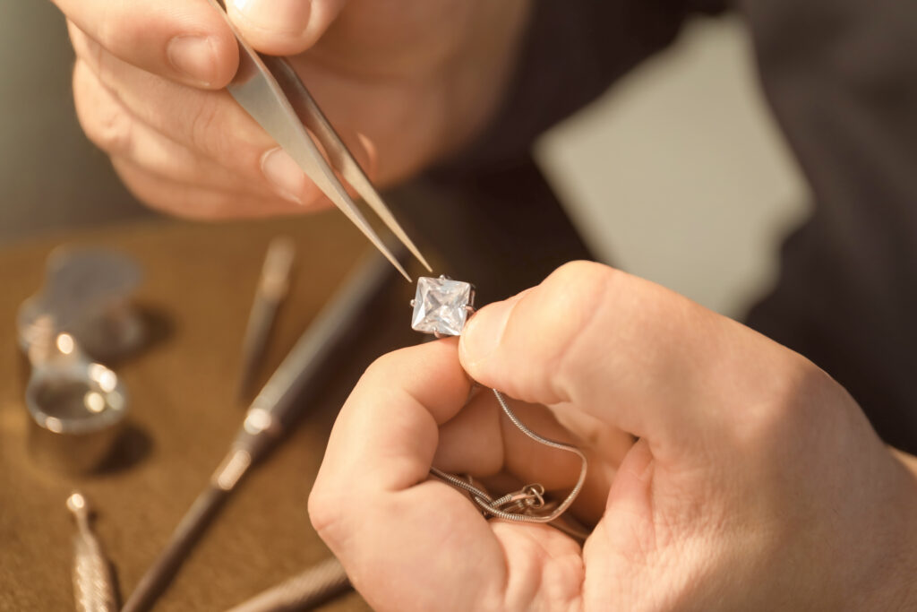 jewellery working at bench at Bell & Brunt jewellery store in Adelaide
