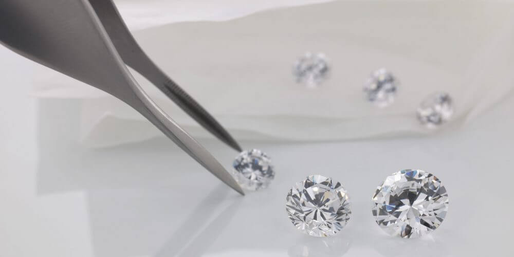 diamond in tweezers