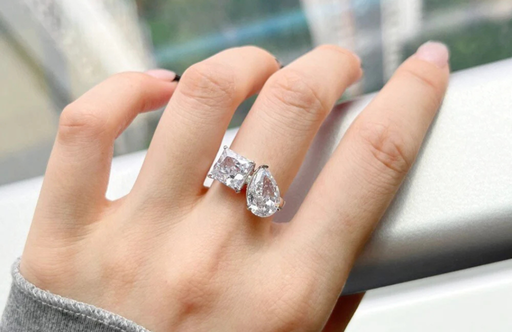 two stone diamond ring on hand