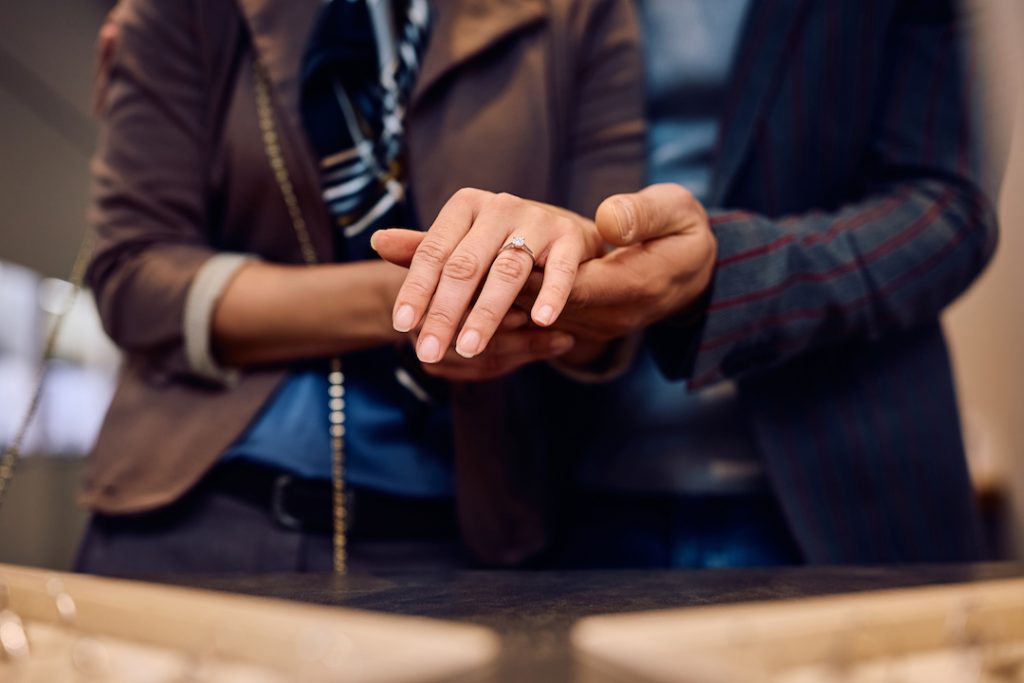 Close up of woman trying on an engagement ring