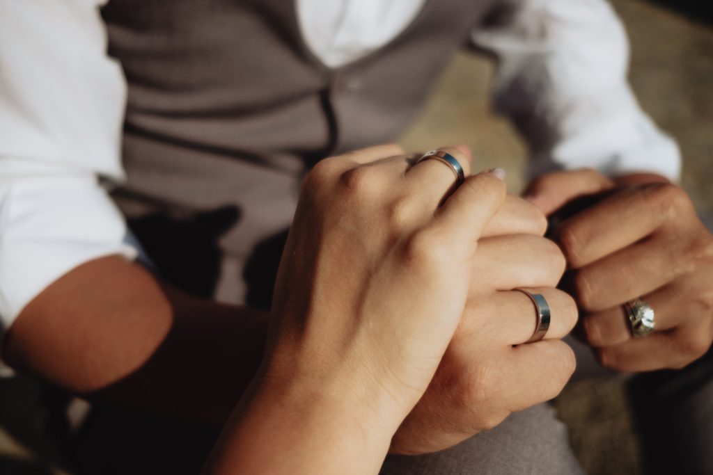 Young couple in love holding hands