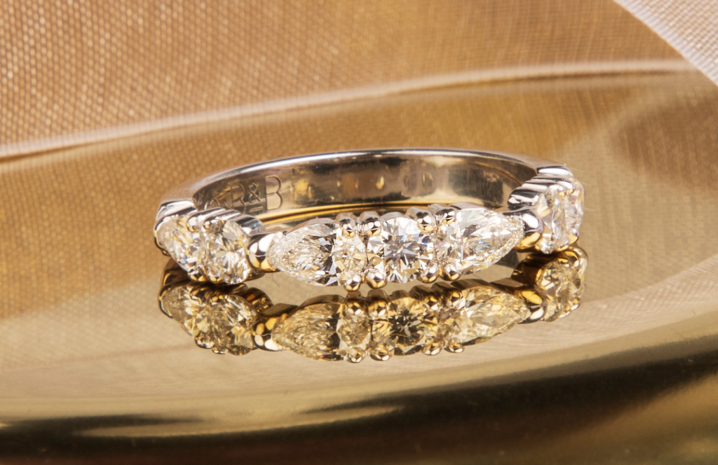 pear and round cut diamond wedding ring