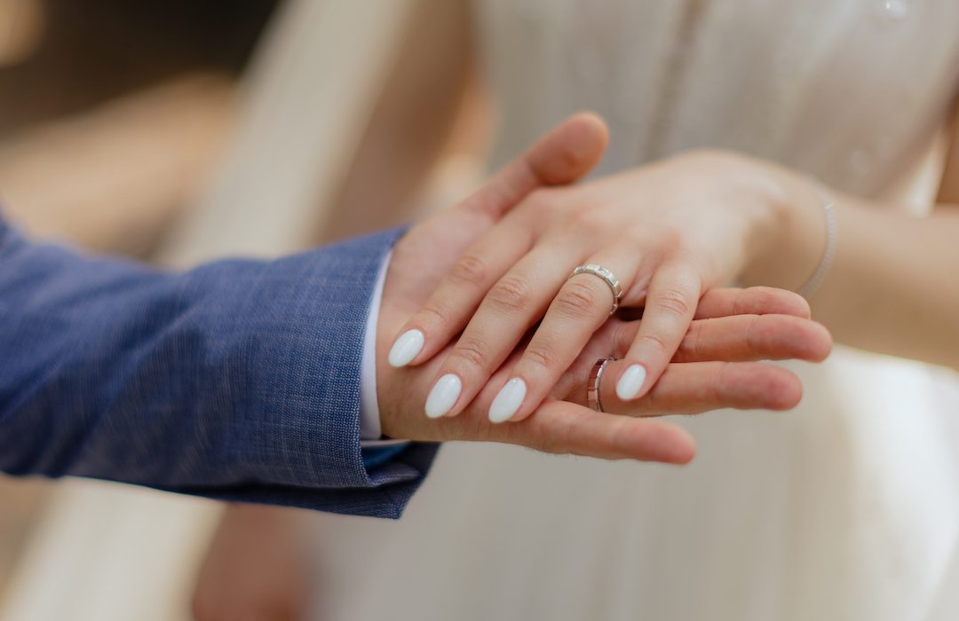 wedding ring on woman's hand