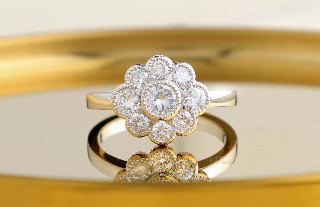 flower inspired halo round diamond engagement ring with millgrain edging