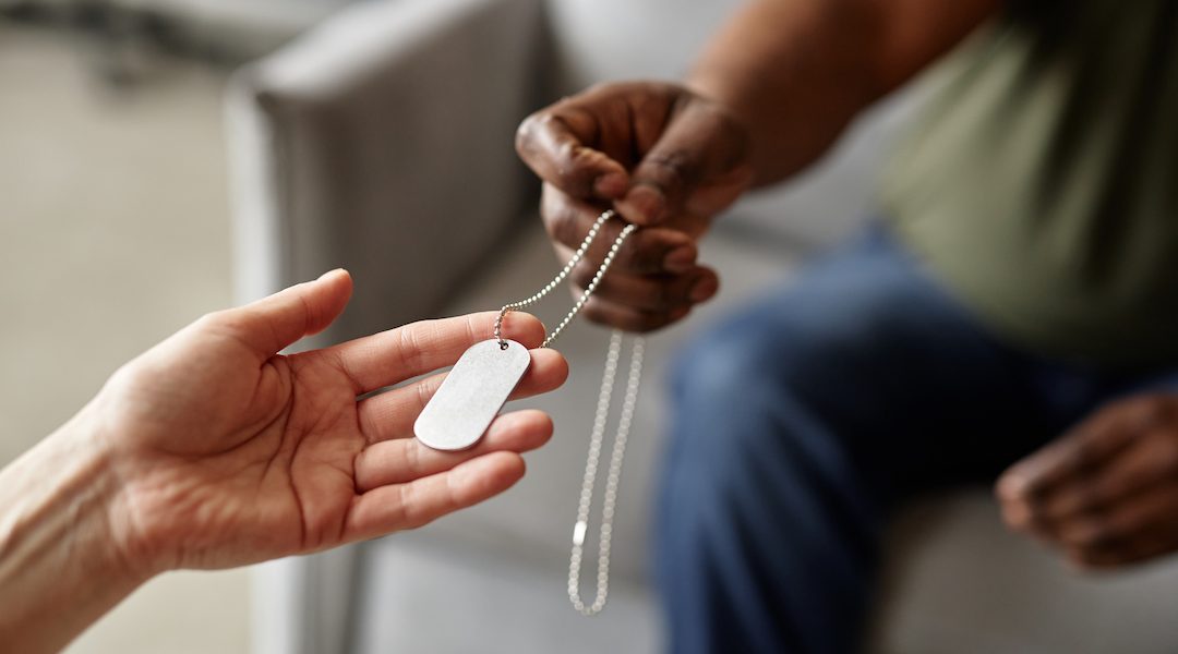Hand Holding ID Necklace