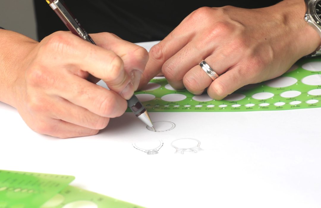 jewellery designer sketching a ring