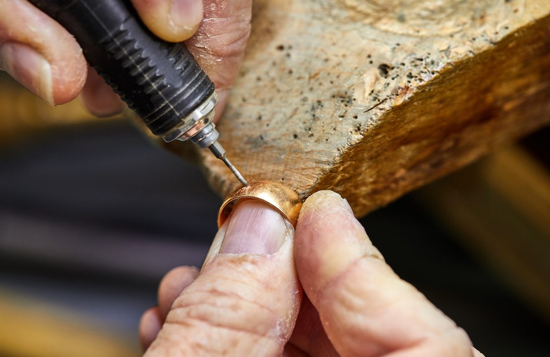 jeweller drilling a ring