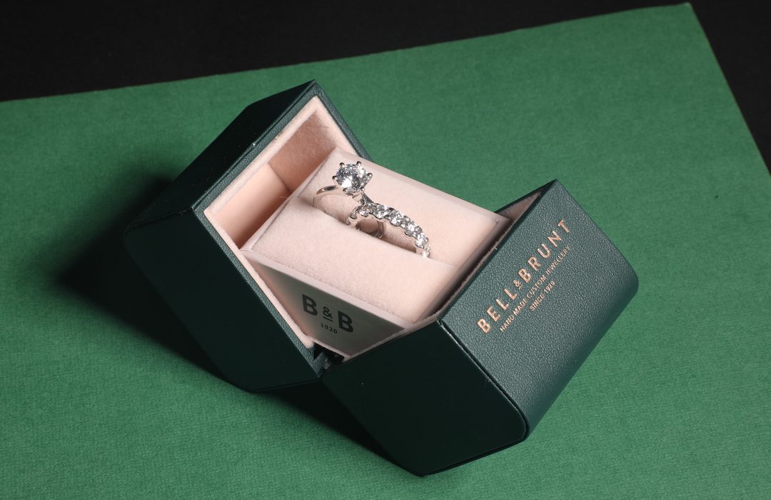 engagement ring and wedding ring in a box