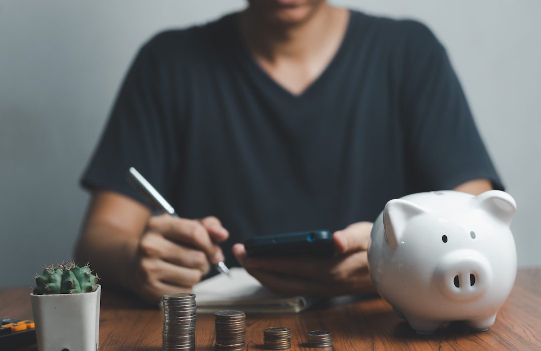 Saving money stack coin and piggy bank investment finance banking economy and tax profit business concept.