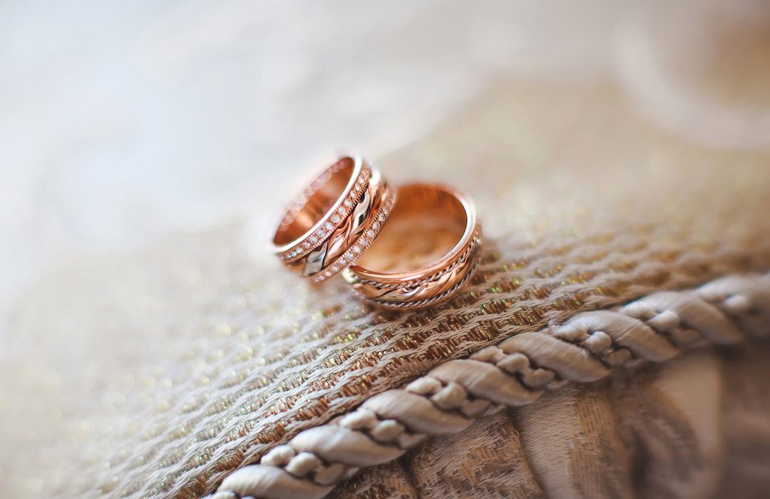 Wedding rings on the couch